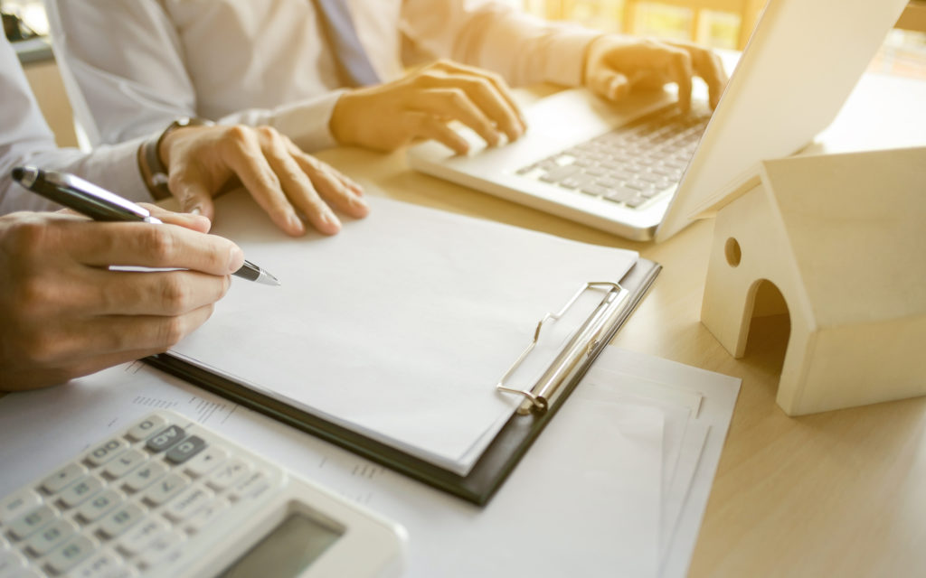 fees-being-calculated-with-calculator